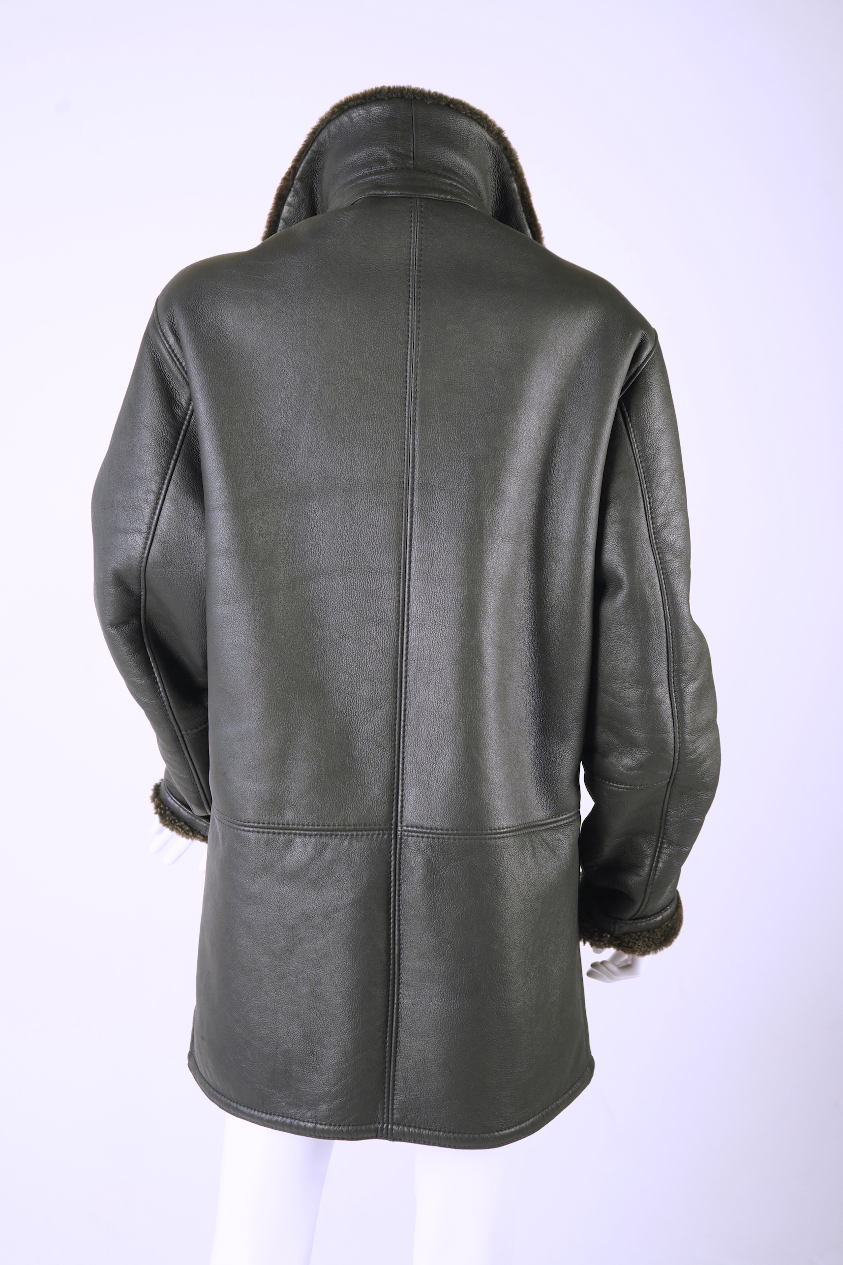 A Hugo Boss black leather fleece lined gentleman's coat Size M